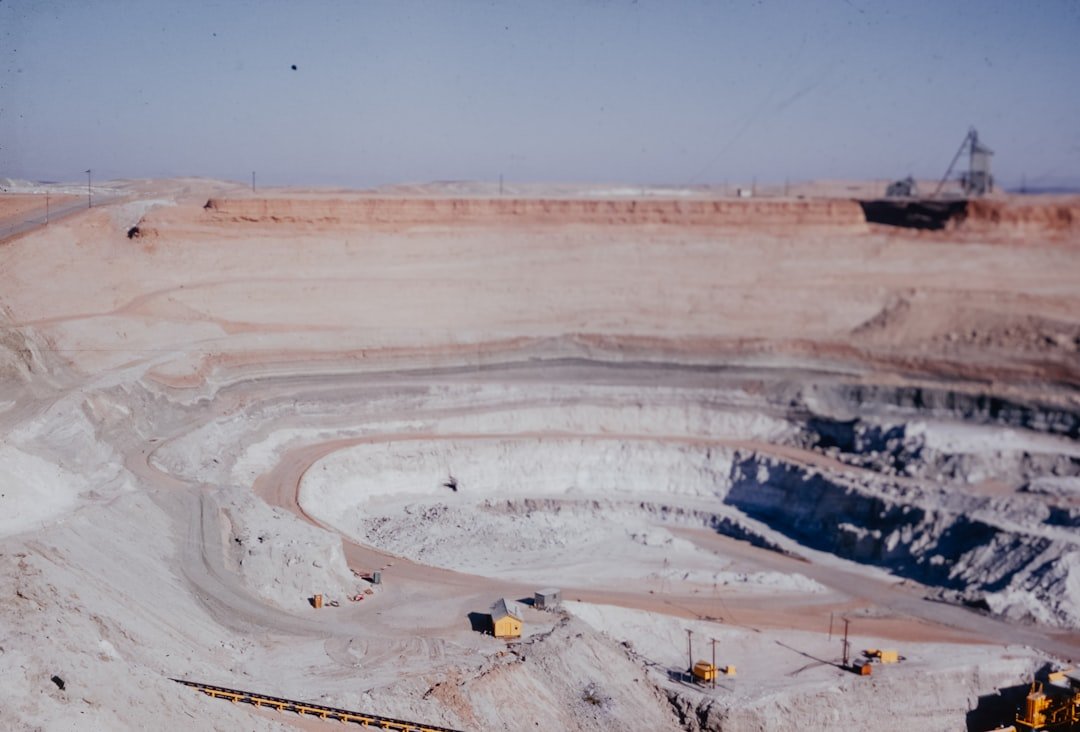 a large open pit filled with lots of dirt