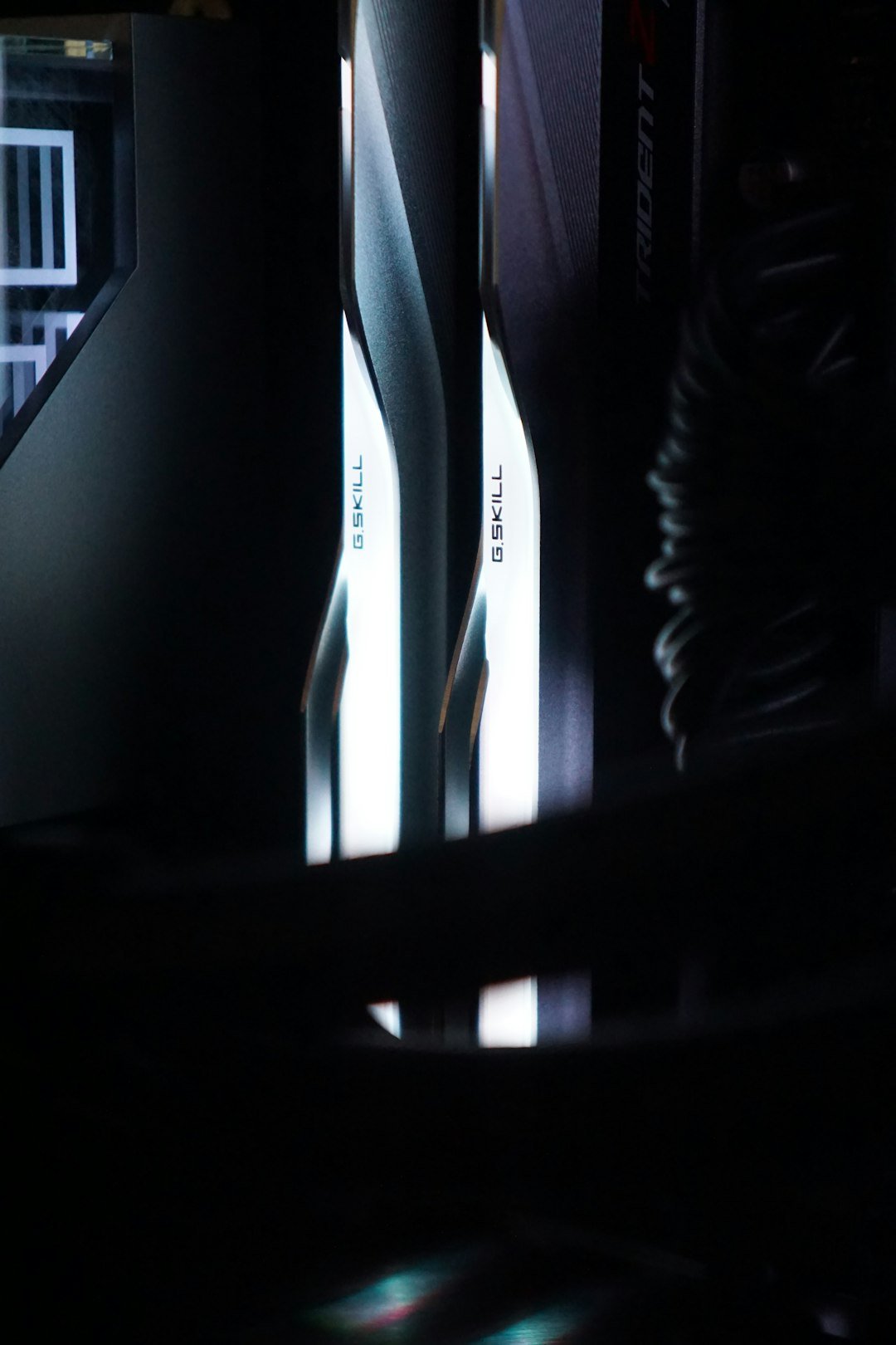 A close up of a computer tower in a dark room