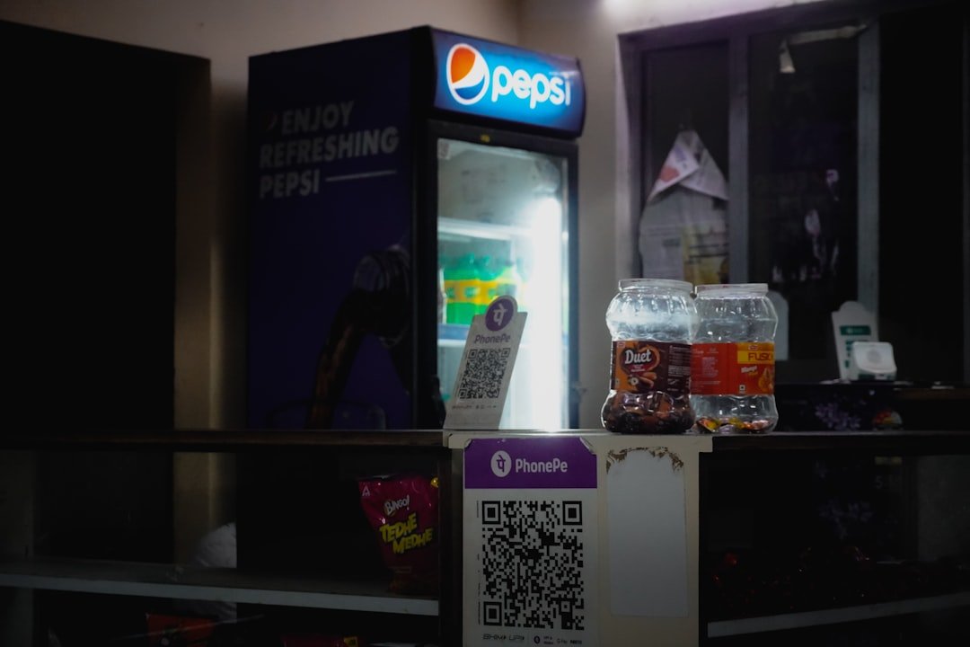 Pepsi cooler with drinks and payment qr code