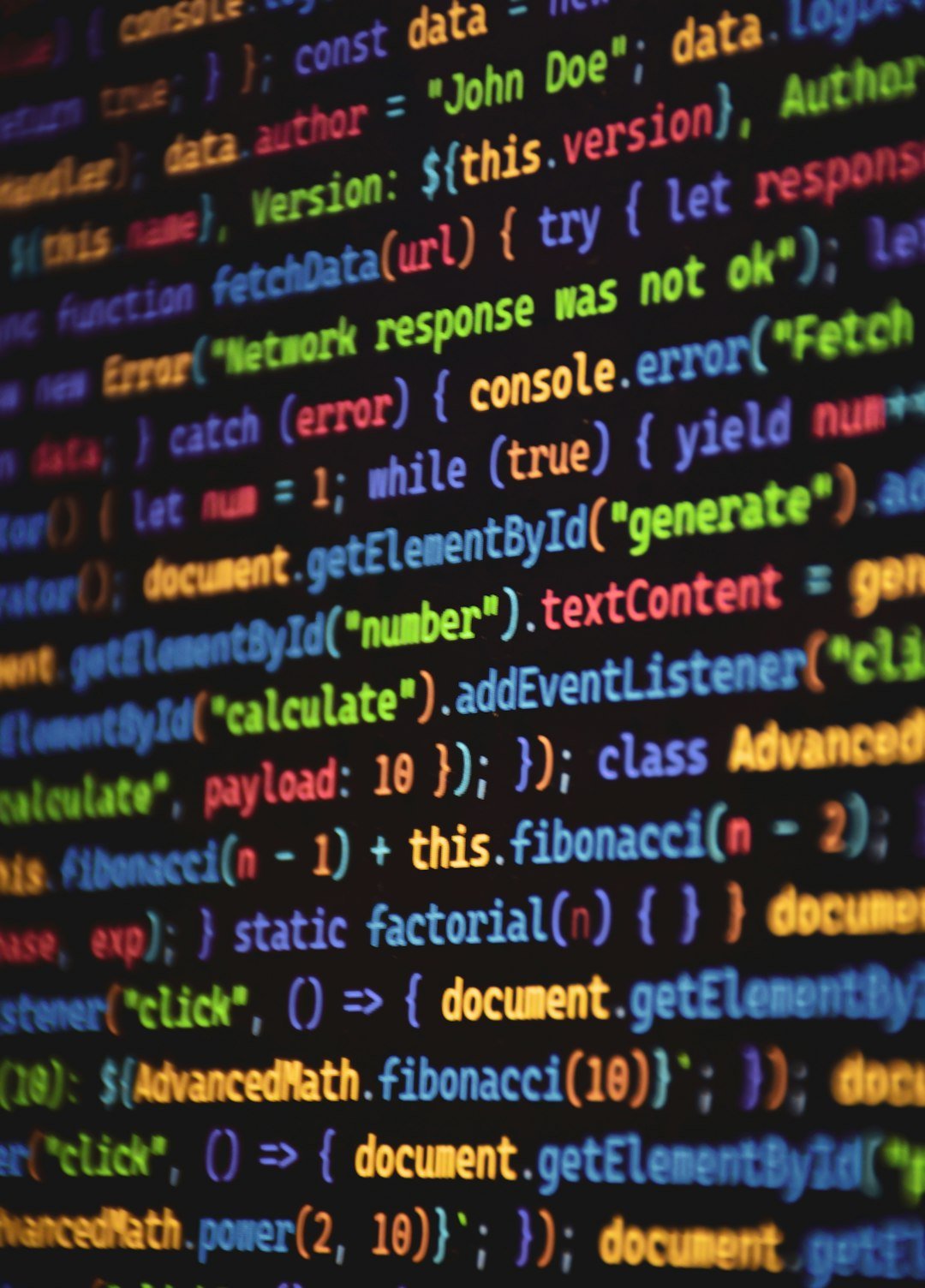 Programming code is shown in a colorful display.