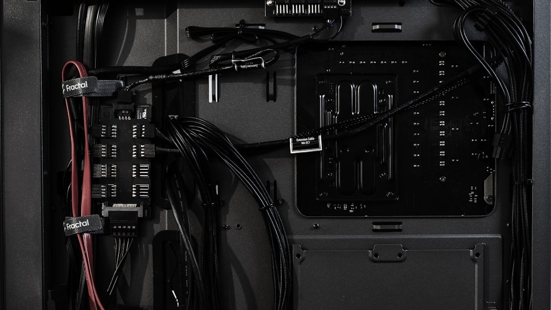 Inside of a computer case with cables.