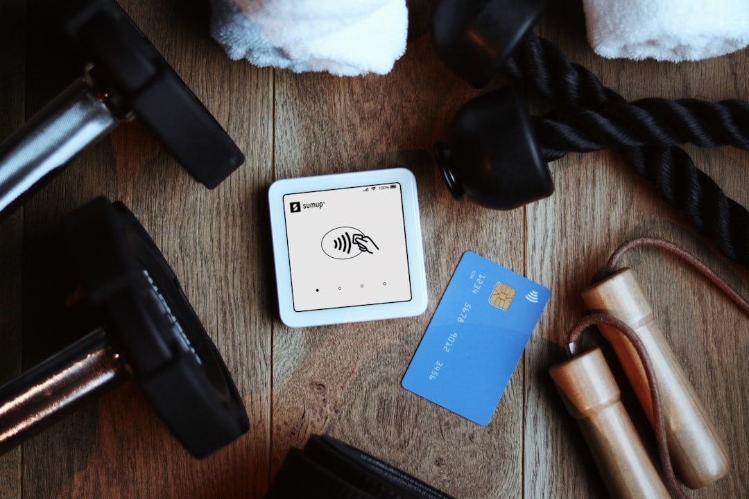 Fitness equipment beside a credit card reader and card.