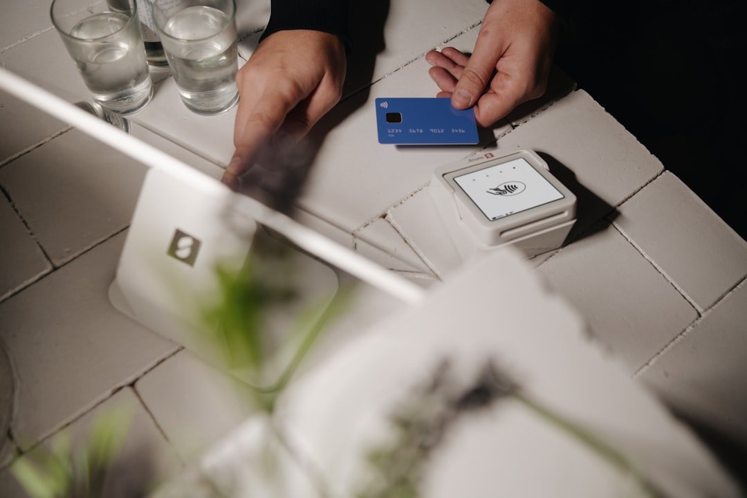 A person is about to pay with a credit card.