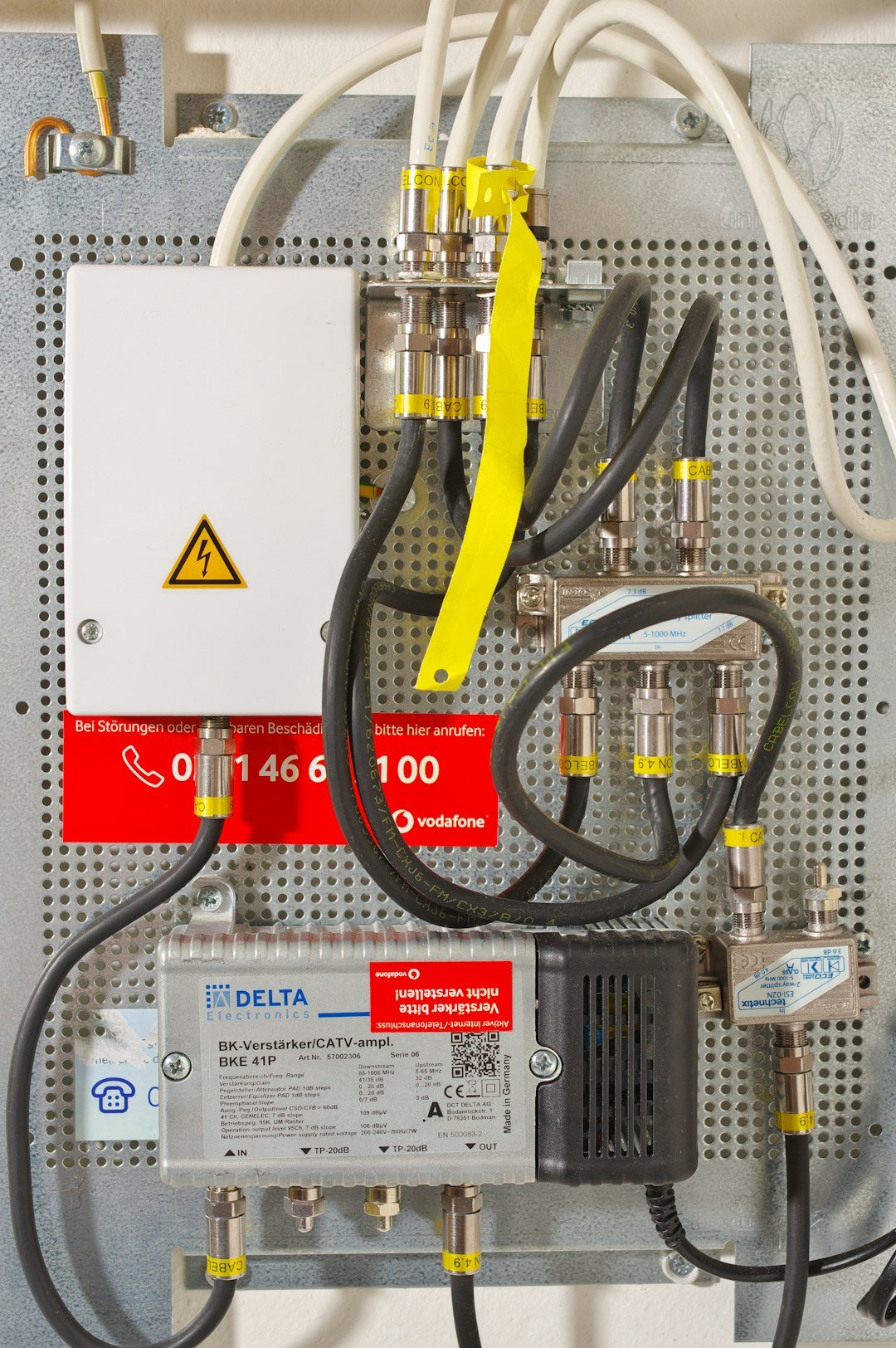 a close up of wires and a switch box