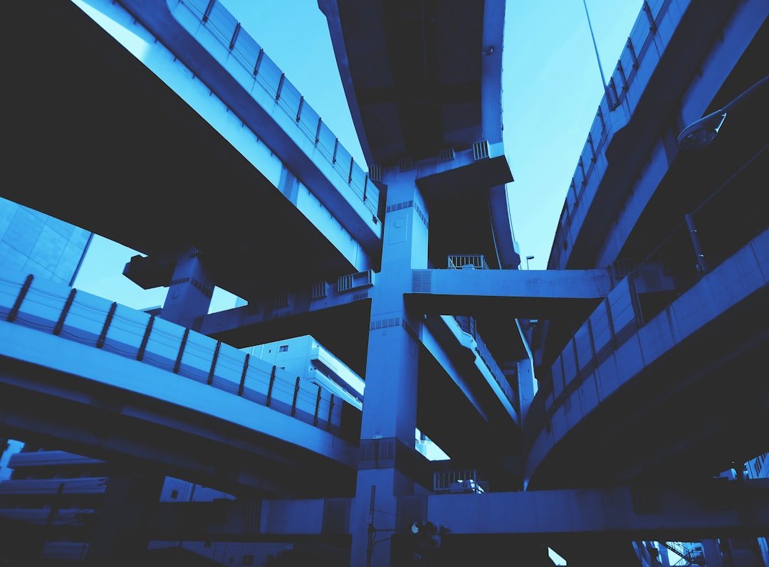 a view of the underside of a bridge from below