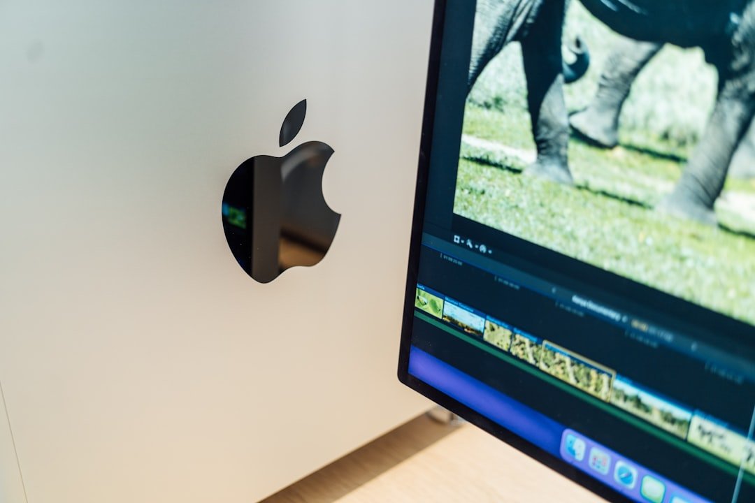 an apple computer monitor with a picture of an elephant on the screen