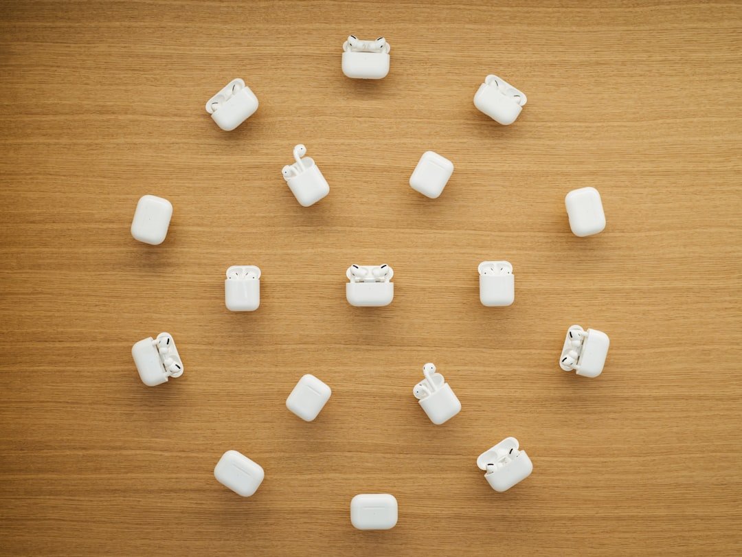 a group of white objects sitting on top of a wooden table