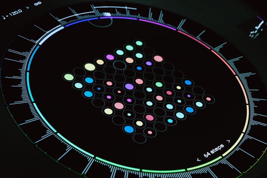 A close up of a clock on a black surface