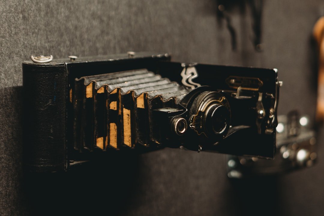 a close up of a camera attached to a wall