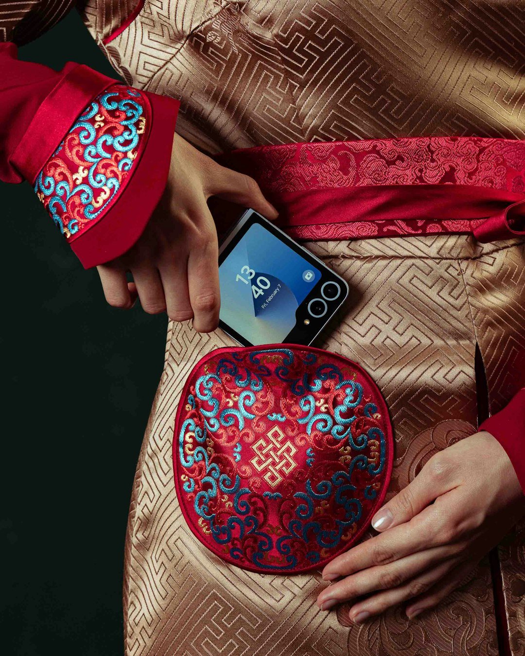 A phone is placed in a traditional pocket.