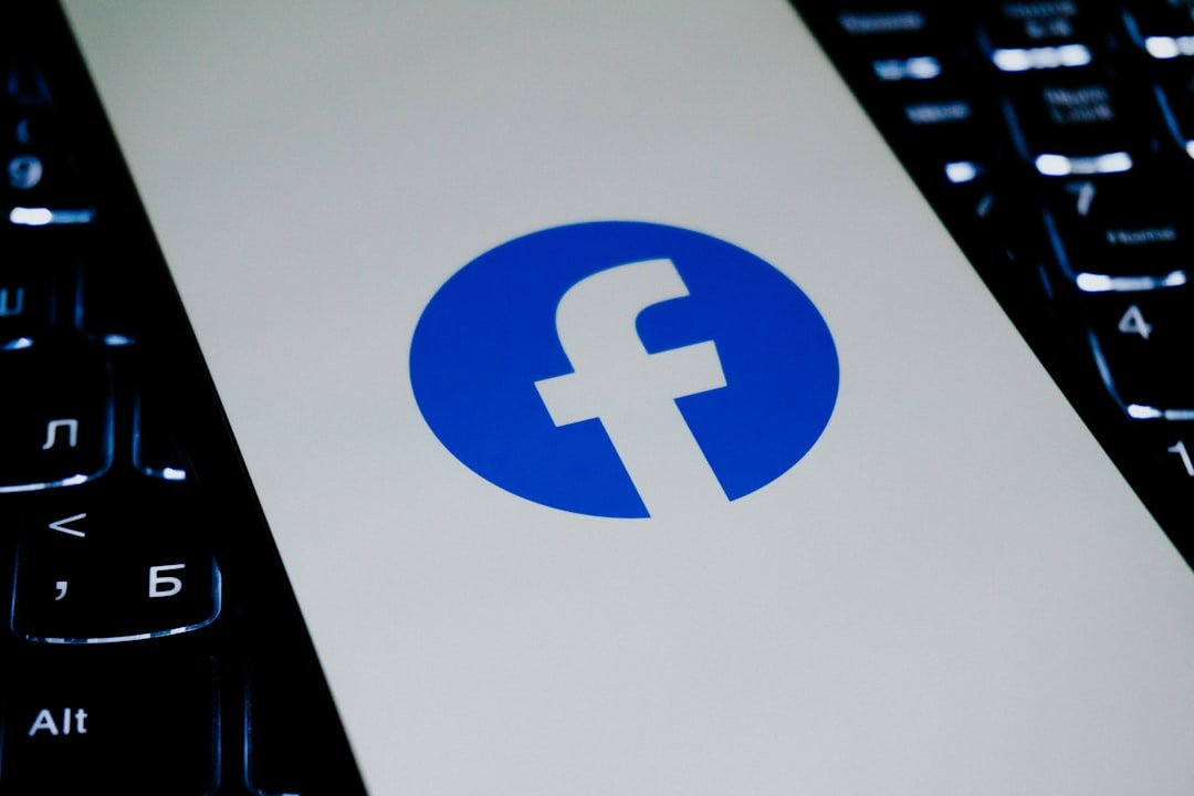 Facebook logo on a laptop keyboard.