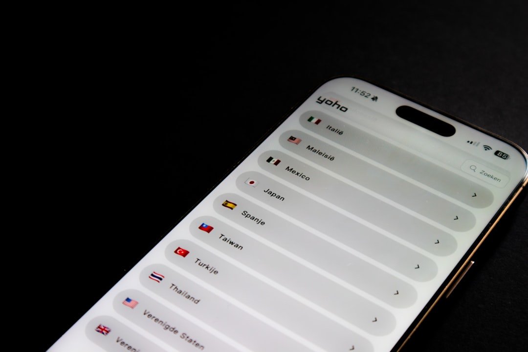 Smartphone screen displaying a list of countries and flags